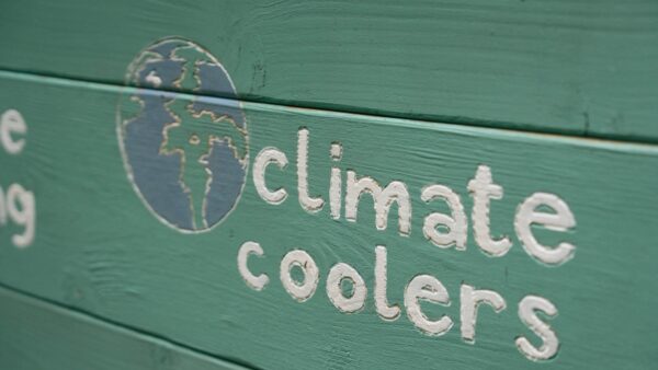 The words climate coolers is painted onto a raised planter