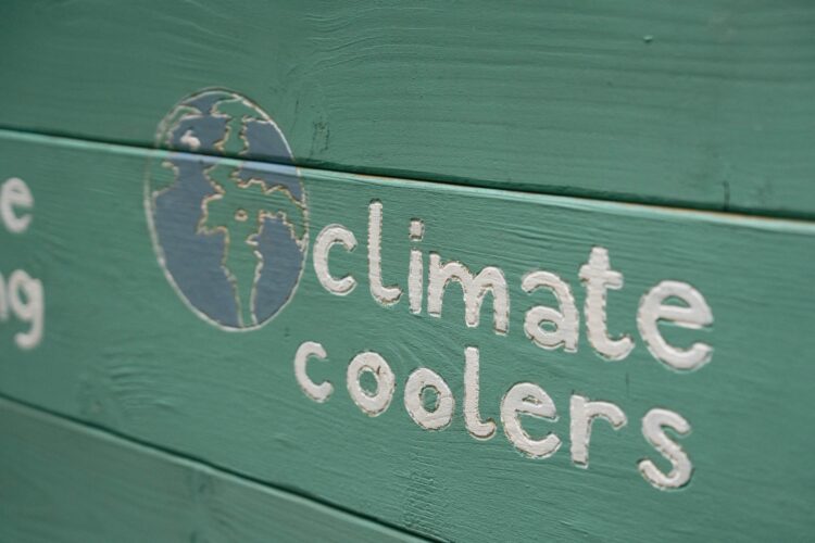 The words climate coolers is painted onto a raised planter