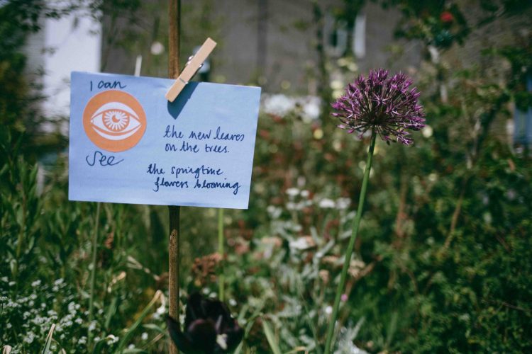 A sensory mapping card pinned on a fence