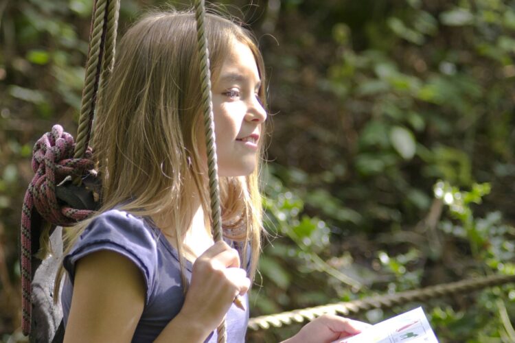 Girl sitting in a favourite sit spot