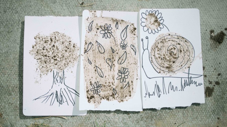 Examples of mud paintings showing flowers and trees