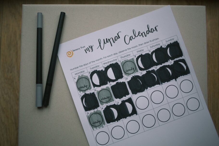 Birds eye view of a partially completed lunar calendar activity